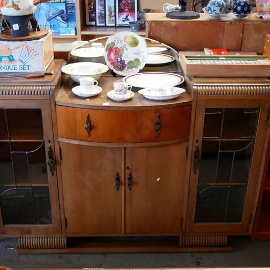 deco sideboard with 2 leadlight doors, 2 slide doors, bow front drawer, small mirror back, some cracks H- 1080, W- 1270,