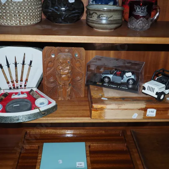calligraphy set, one carved Maori themed bookend, cigar box and 2 model vehicles