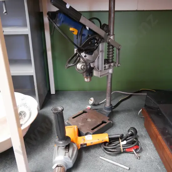 2 electric drills and drill press