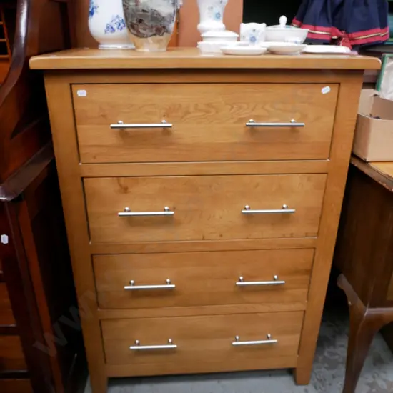 oak 4 drawer tall boy in very good condition H- 960, W- 700, D- 400