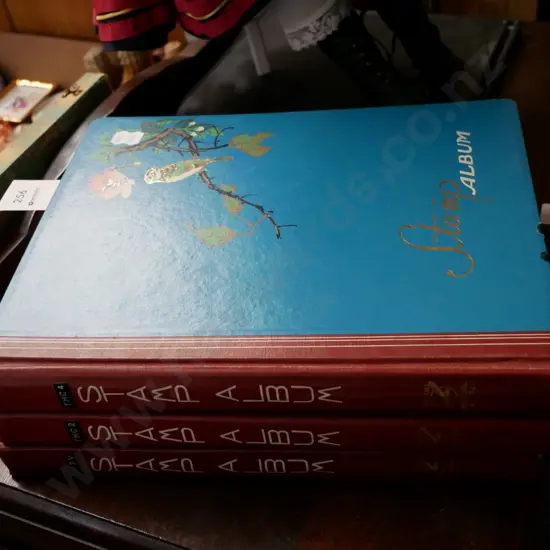 3 stamp albums