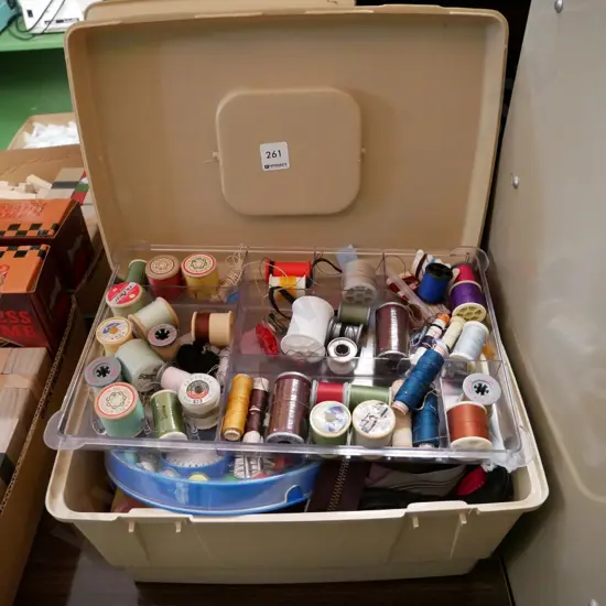sewing box and contents, zips, thread, binding etc, latches on box are broken