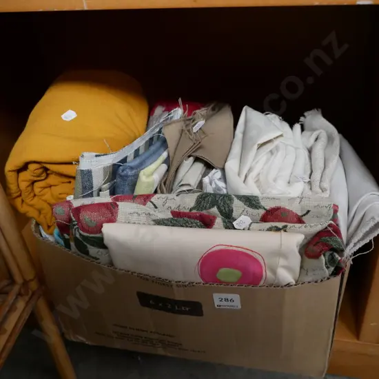 box of fabric pieces