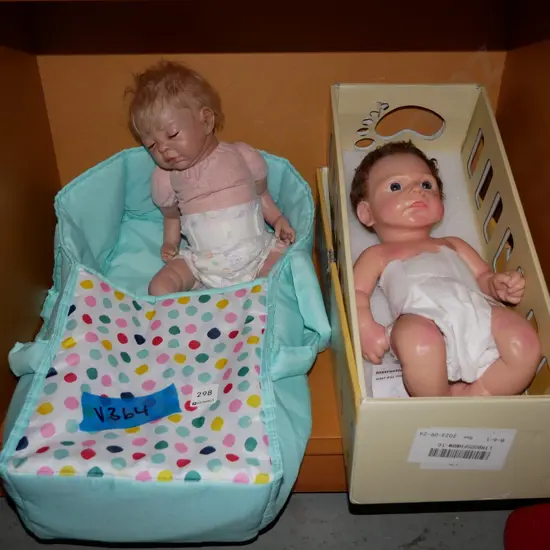 2 infant dolls