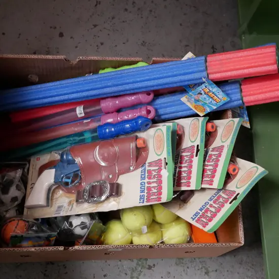 box; foam water blasters, plastic toy guns, tennis balls etc