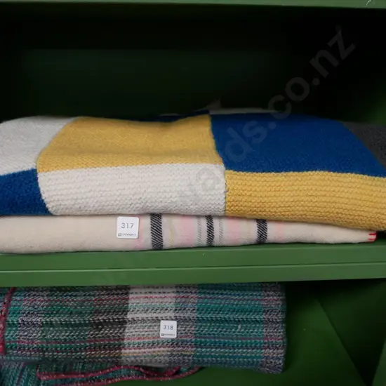 checked knitted blanket and woollen blanket