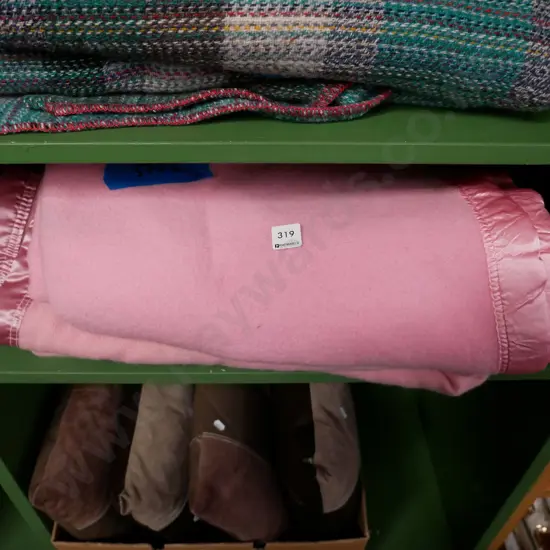 2 pink woollen blankets