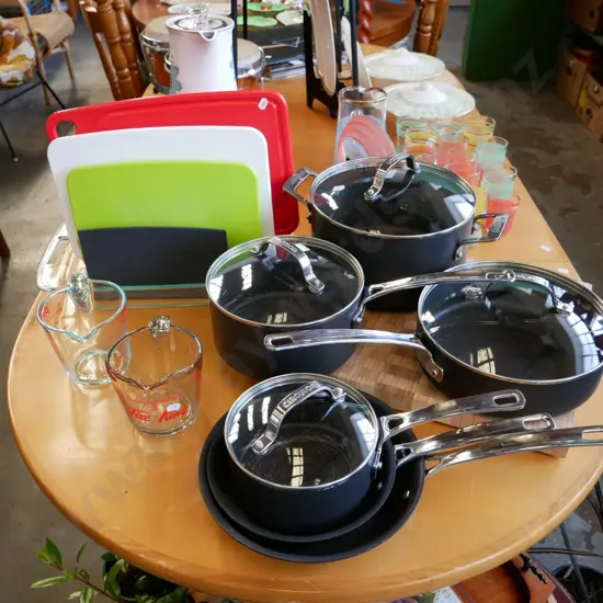 Circulon pots, frying pans, Pyrex jugs, chopping boards and glass baking tray