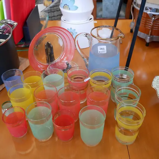 coloured glass tumblers, bowls, water jugs