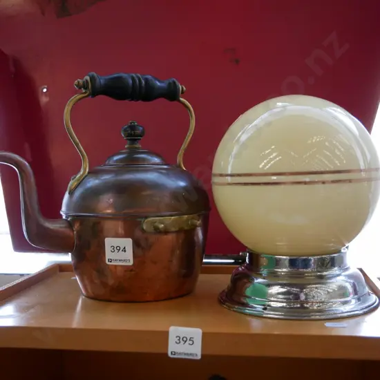 copper teapot and deco light fitting