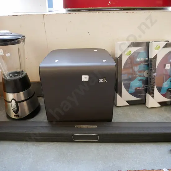 Polk soundbar with accessories and bass speaker