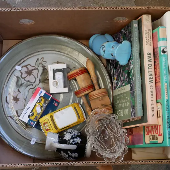 box; books, studio pottery plate, model vehicles etc