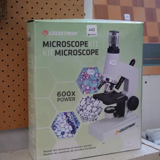boxed Celestron microscope kit and microscope