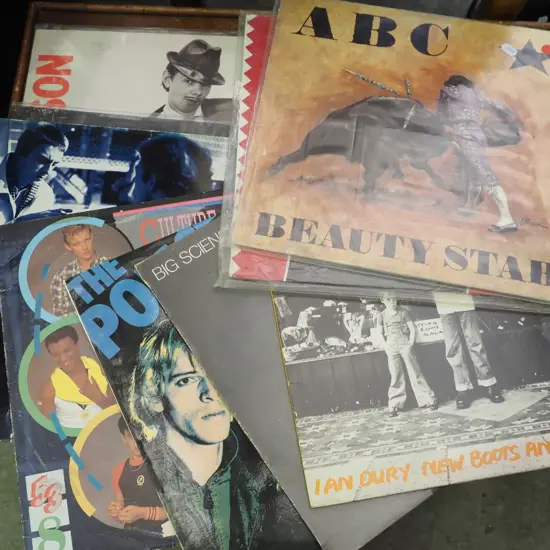 stack of LPs, ABC, Paul Young, Ian Dury