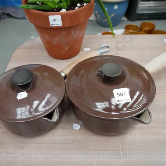 2 cast iron and enamel lidded pouring pots, some damage inside
