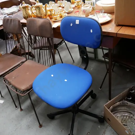 blue upholstered office chair