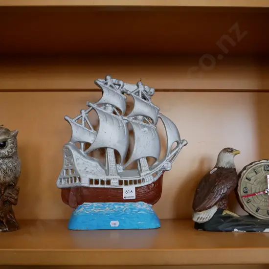 owl candle,  alloy galleon model and eagle themed mantel clock
