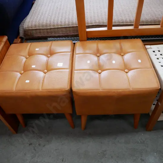 pair of vinyl upholstered deep buttoned footstool