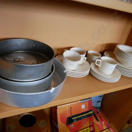 plastic plates, bowls, cups, pudding and cake tins