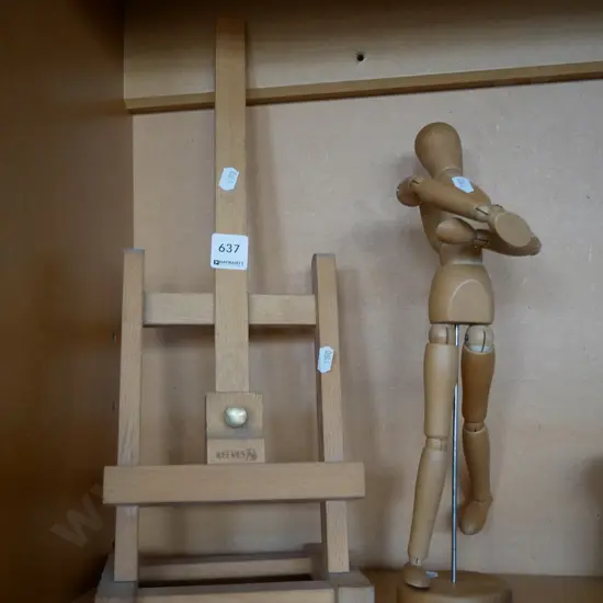 artist's articulated wooden model and easel