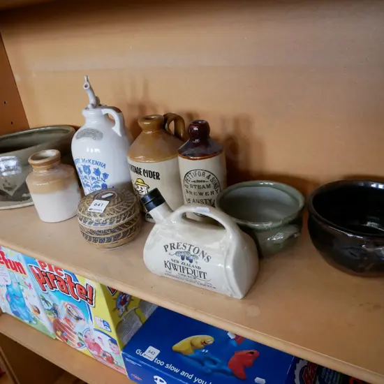 studio pottery bowls, whisky bottles and small lidded canister