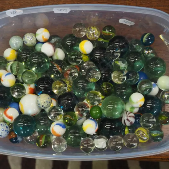 plastic tray of marbles
