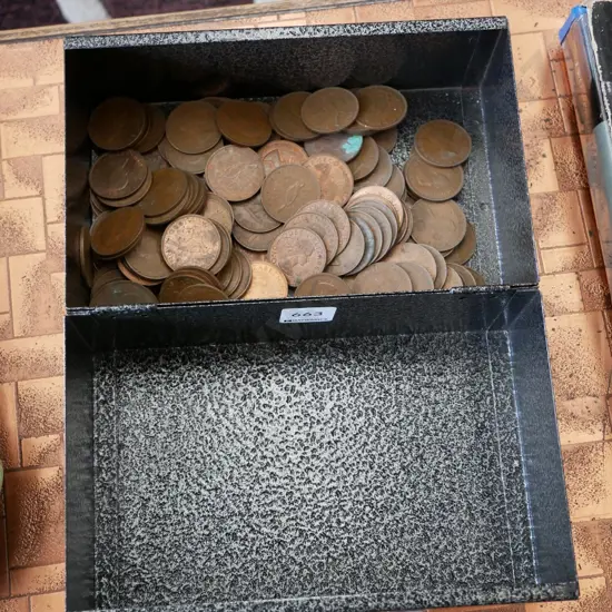 metal box and copper coins