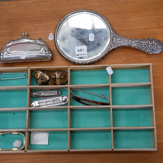 hand held mirror, plated clutch purse, hairclips etc
