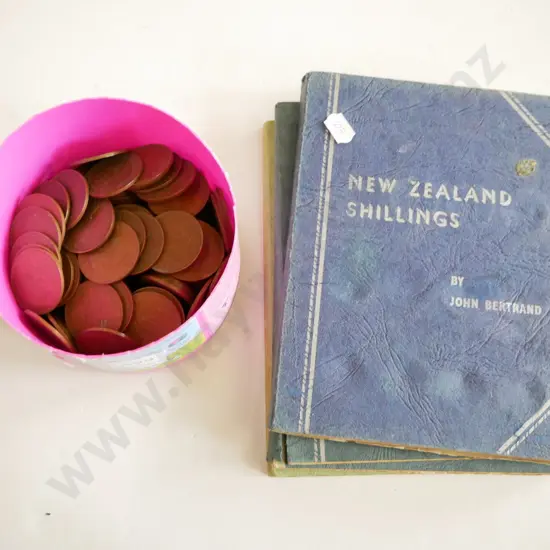 plastic tub of coins and coin albums