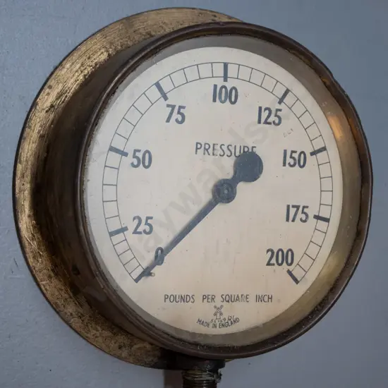 large brass cased pressure gauge - marked Made in England. D-180