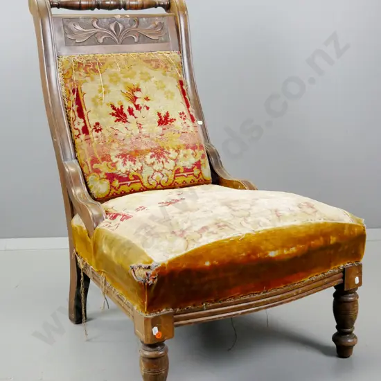 restorer's Edwardian lady's chair with turned top rail, foliate decoration. Wear to original upholstery,