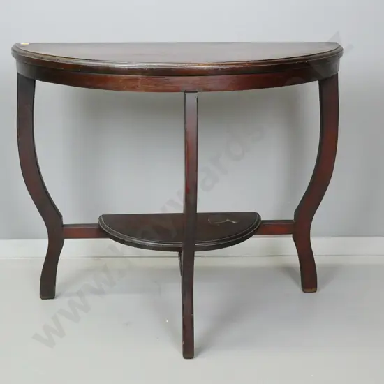 art deco mixed timber dark stained half-round occasional table w/3 shaped legs, bottom shelf - wear to polish on top