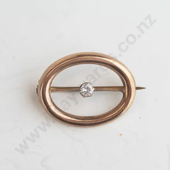 9ct oval brooch, rose gold with white stone, 1.2gms