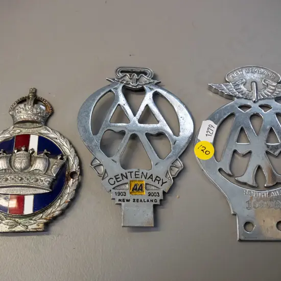 3 chrome car badges - AA Southland H-130, AA 2003 centenary, and one with enamel insert and crown motifs