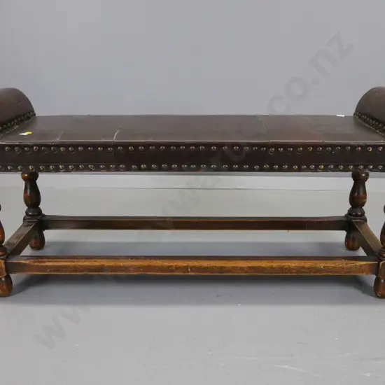 vintage oak low bench seat with embossed and studded leather top, turned legs, box stretcher base - some wear to rails,