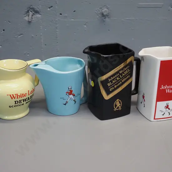 4 Scotch whisky water jugs all made by Wade - 3 are Johnnie Walker. Tallest is H170