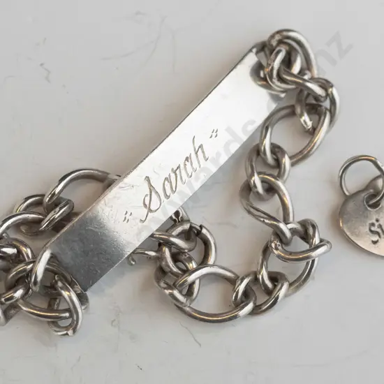 silver ID bracelet "Sarah' stamped stg sil & & silver heart charm 'sister' stamped 925