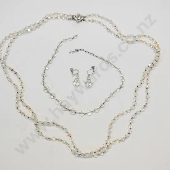 2 strand long crystal necklace. single strand short crystal necklace & pair of crystal earrings