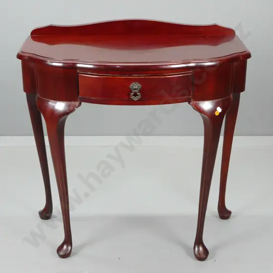 reproduction mahogany side table with serpentine front, single drawer, turned legs w/ pad feet - some crazing to polish