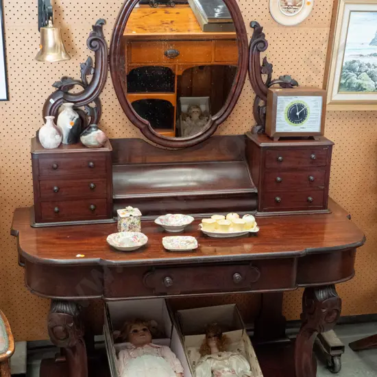 Victorian mahogany dressing table with oval mirror, lift-up jewellery compartment, 6 small upper drawers, 1 lower