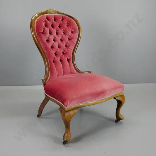 vintage Victorian style mahogany cab-leg lady's chair w/ shaped deep-button back, pink velvet, on porcelain casters