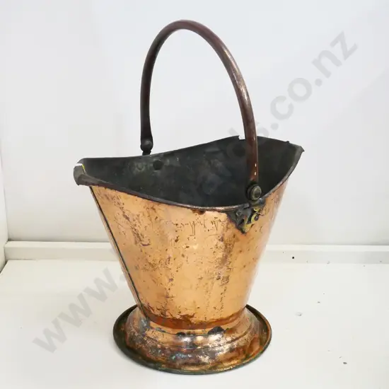 beaten copper coal scuttle - holes and damage. H-300 with handle down W-390