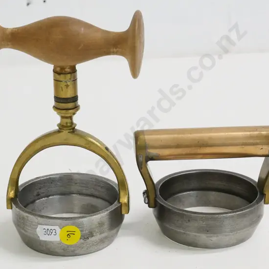 2 "host cutter" communion bread cutters - one with brass handle, one brass and wood, taller is H-170