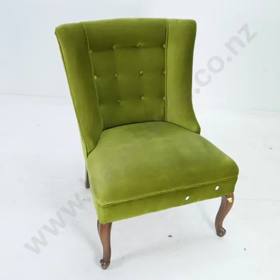 armless lounge chair with olive green velvet deep-button upholstery, some wear to finish on legs H-870 W-600 D-700