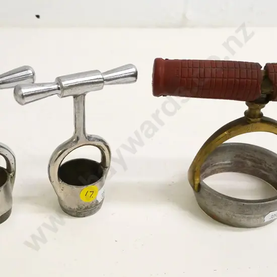 3 "host cutter" communion bread cutters - one with brass rubber-coated handle, two are steel, taller is H-120