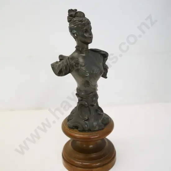small cast metal figure of a woman on wooden base - marked 'Schreiner' H-200