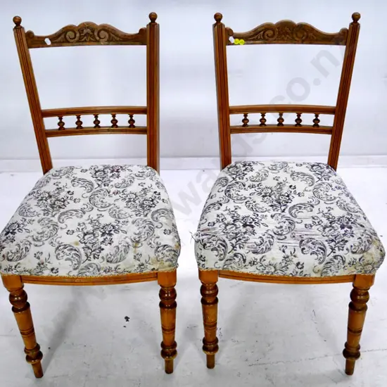 pair of rimu Edwardian spindle and carved back dining chairs, movement to joints, worn upholstery H-880 W-430 D-410