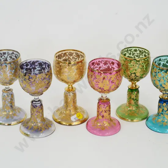 set of 6 various coloured stemmed glasses with heavy gold decoration H-140
