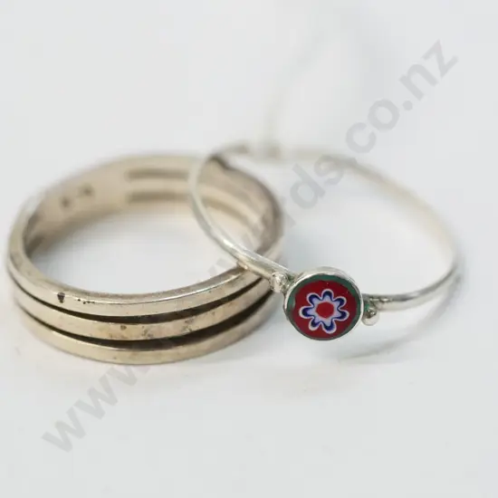 2 silver rings both stamped 925