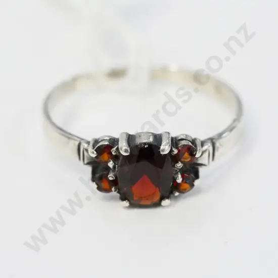 silver & garnet ring stamped stg.sil